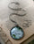 Remember to Live Looking Glass Pendant
